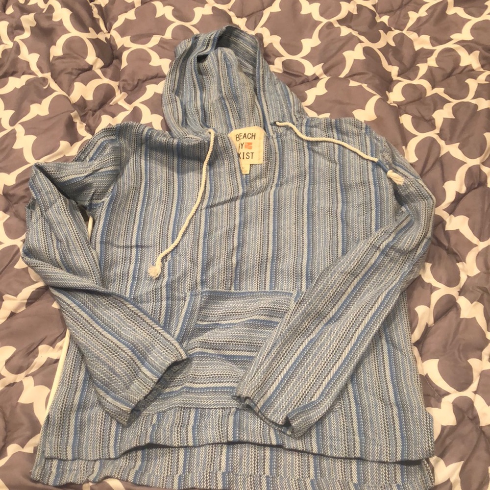 Blues 100 %cotton.  Not much stretch.  More like a S/Misses M fit 5ft 120lb